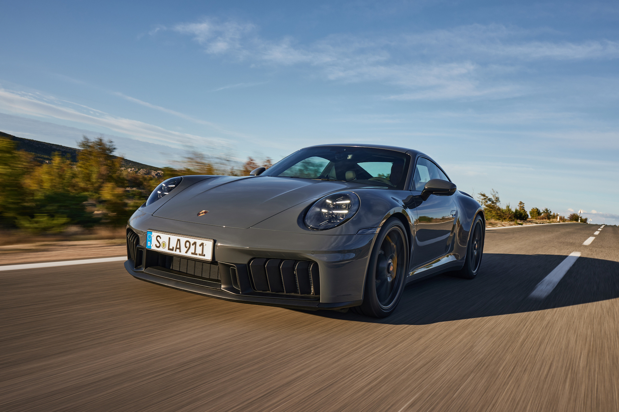 Porsche 911 Carrera GTS left front three-quarter view.