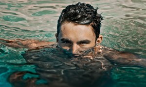 man's face in water