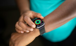 man wearing Apple Watch on wrist