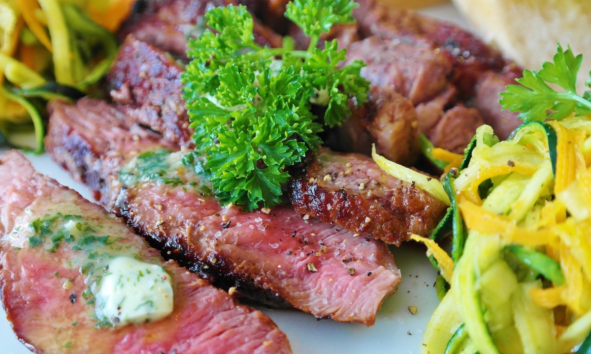 Sliced steak on plate