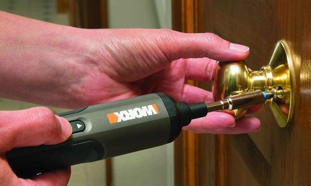 Worx cordless screwdriver deal man using on doorknob
