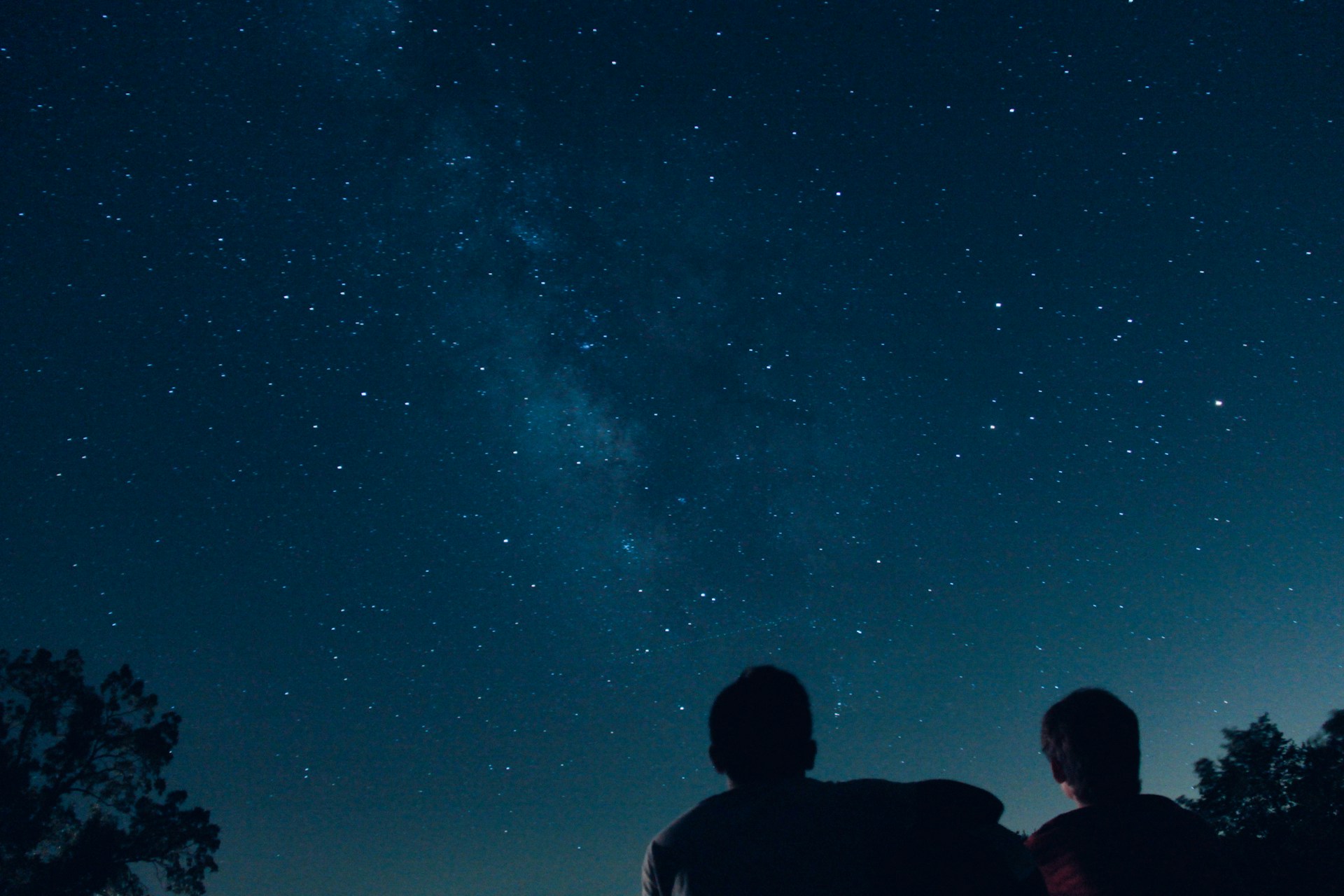 Two people watching stars