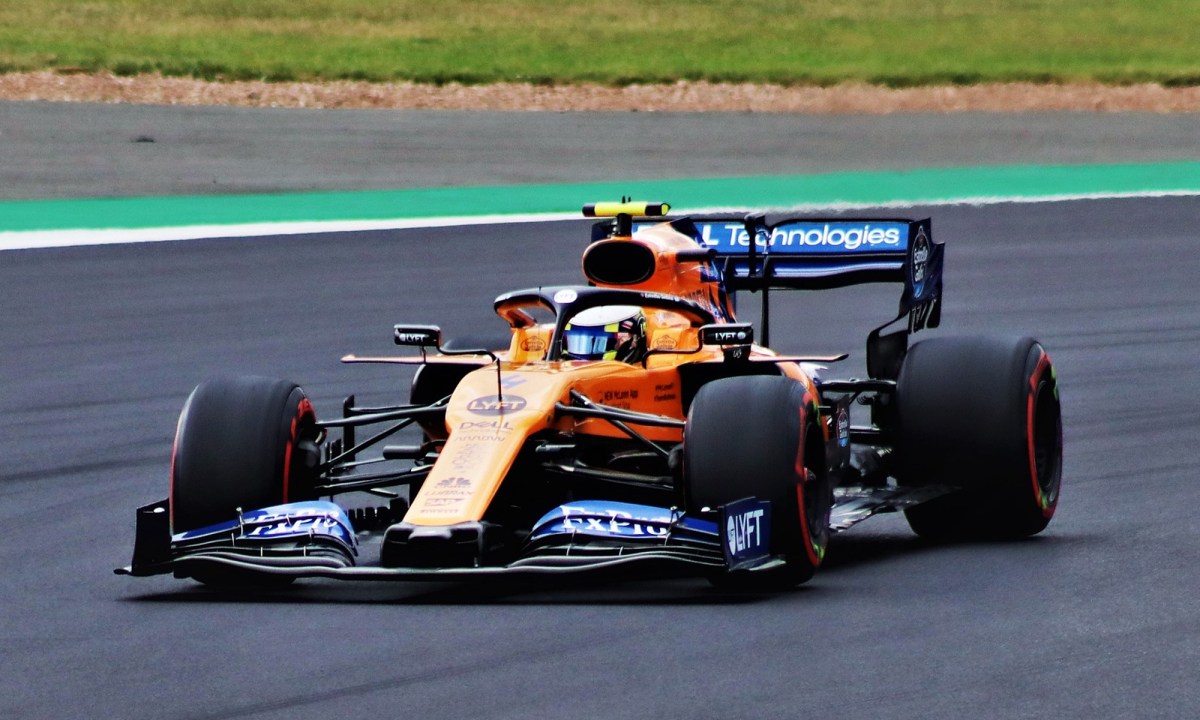 Lando Norris driving a McLaren F1 race car.