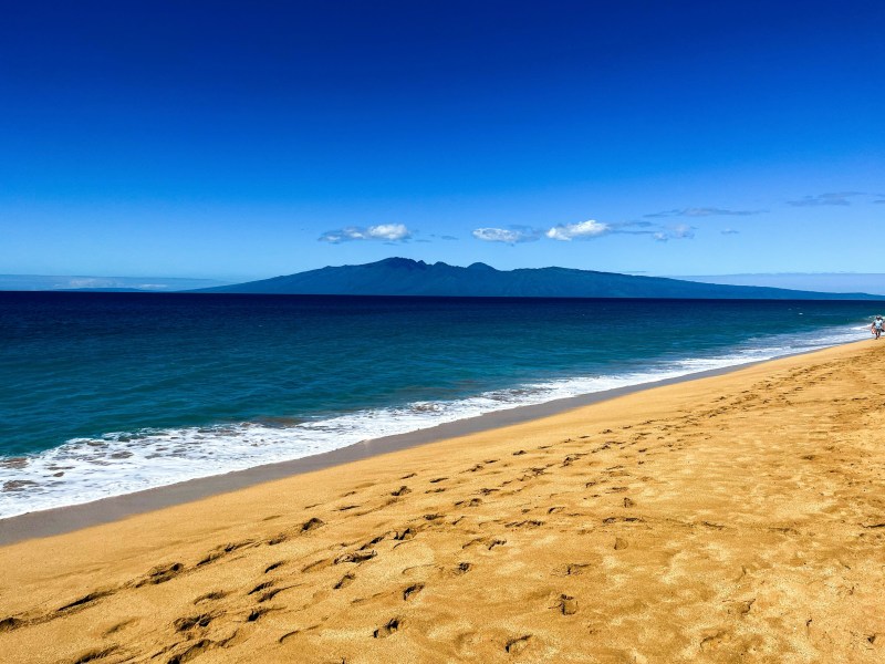Sand ocean and mountains around Maui
