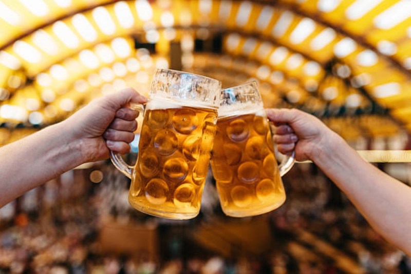 Oktoberfest cheers with beer steins