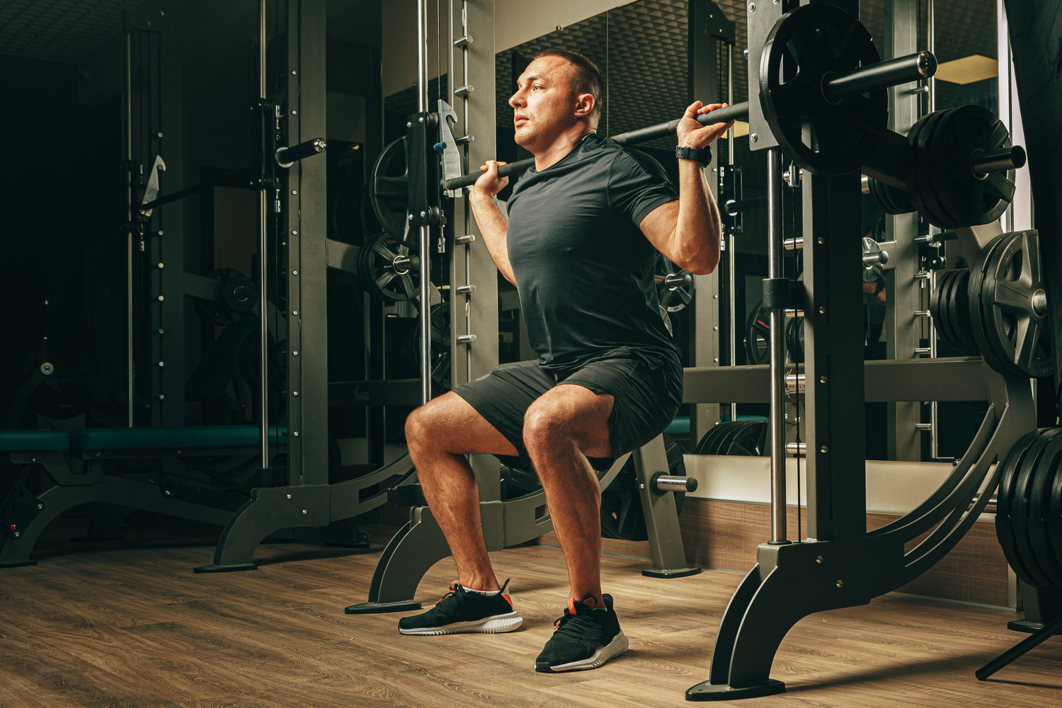 Man doing Smith machine squats
