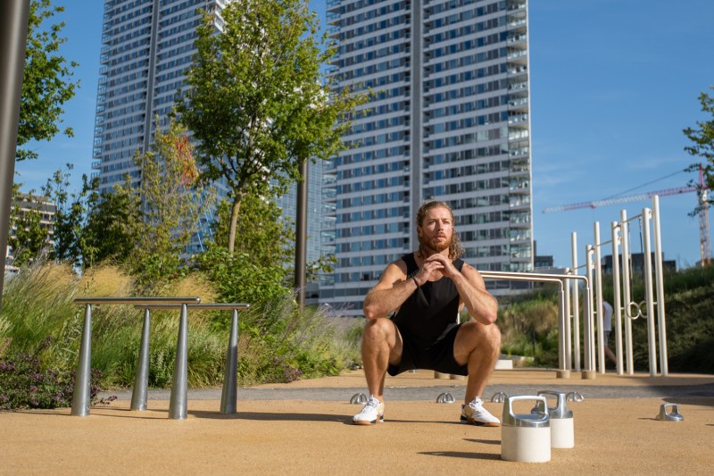 Man doing air squats
