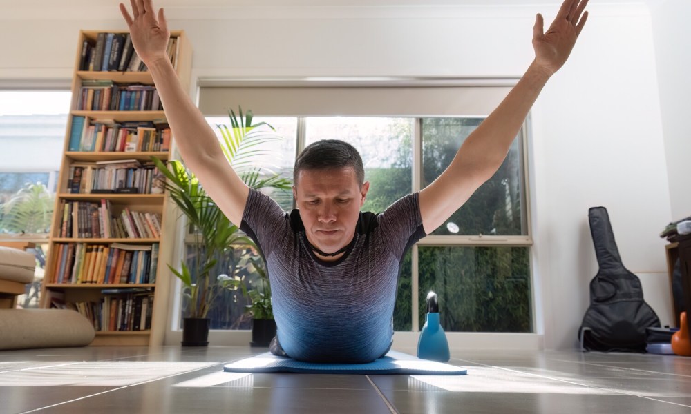 Man doing superman exercise
