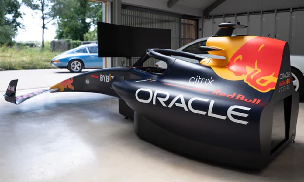 Red Bull RB18 Simulator in a garage with garage door open.