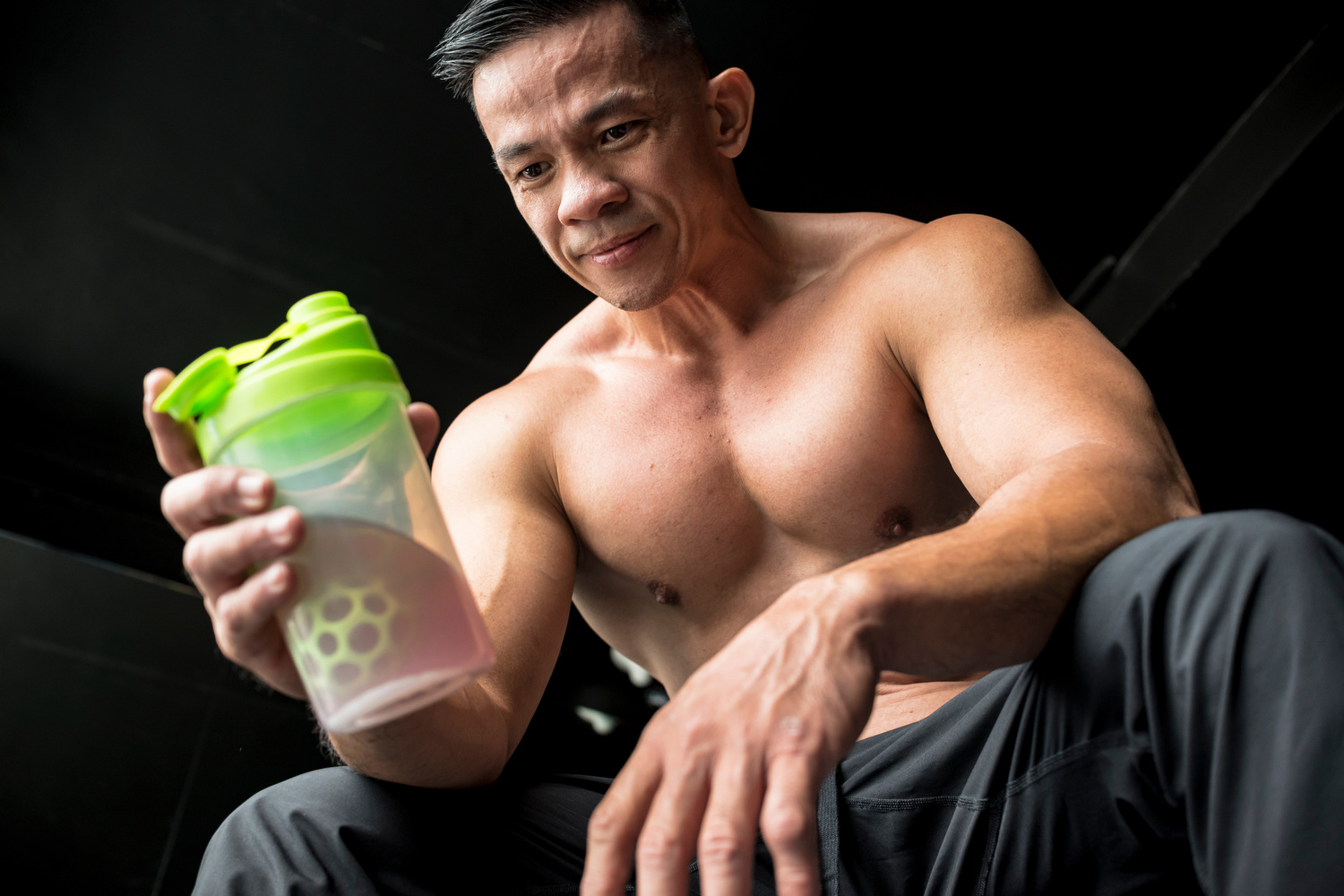 Man with pre-workout drink