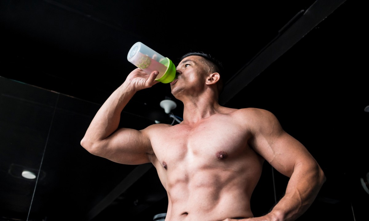 Man drinking pre-workout
