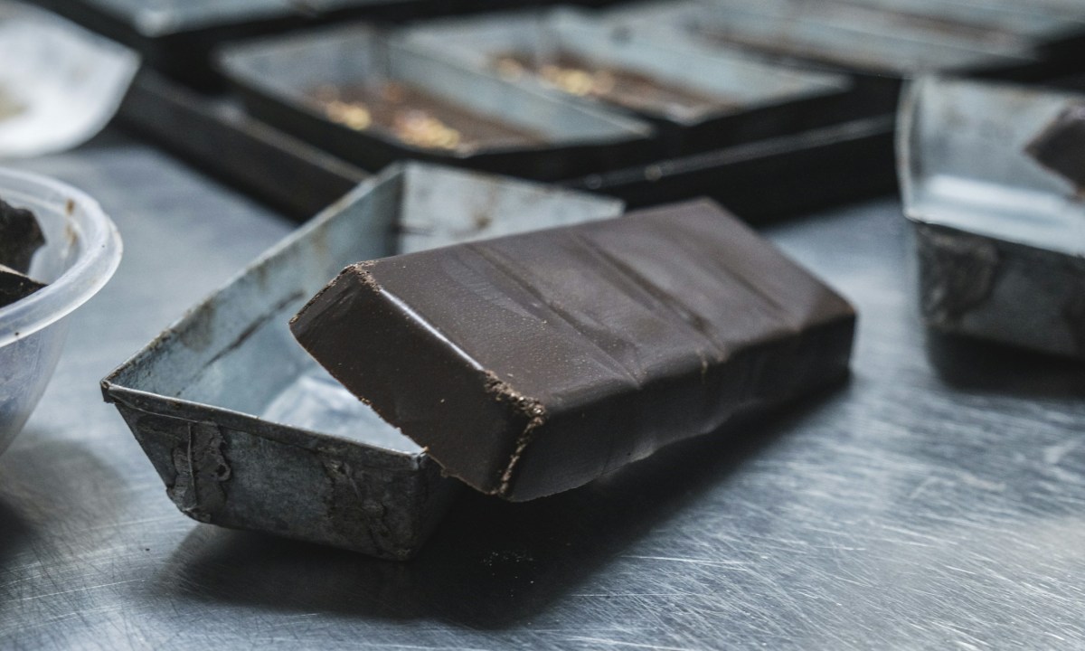 Chocolate bar in grey container from best chocolate cigars list.