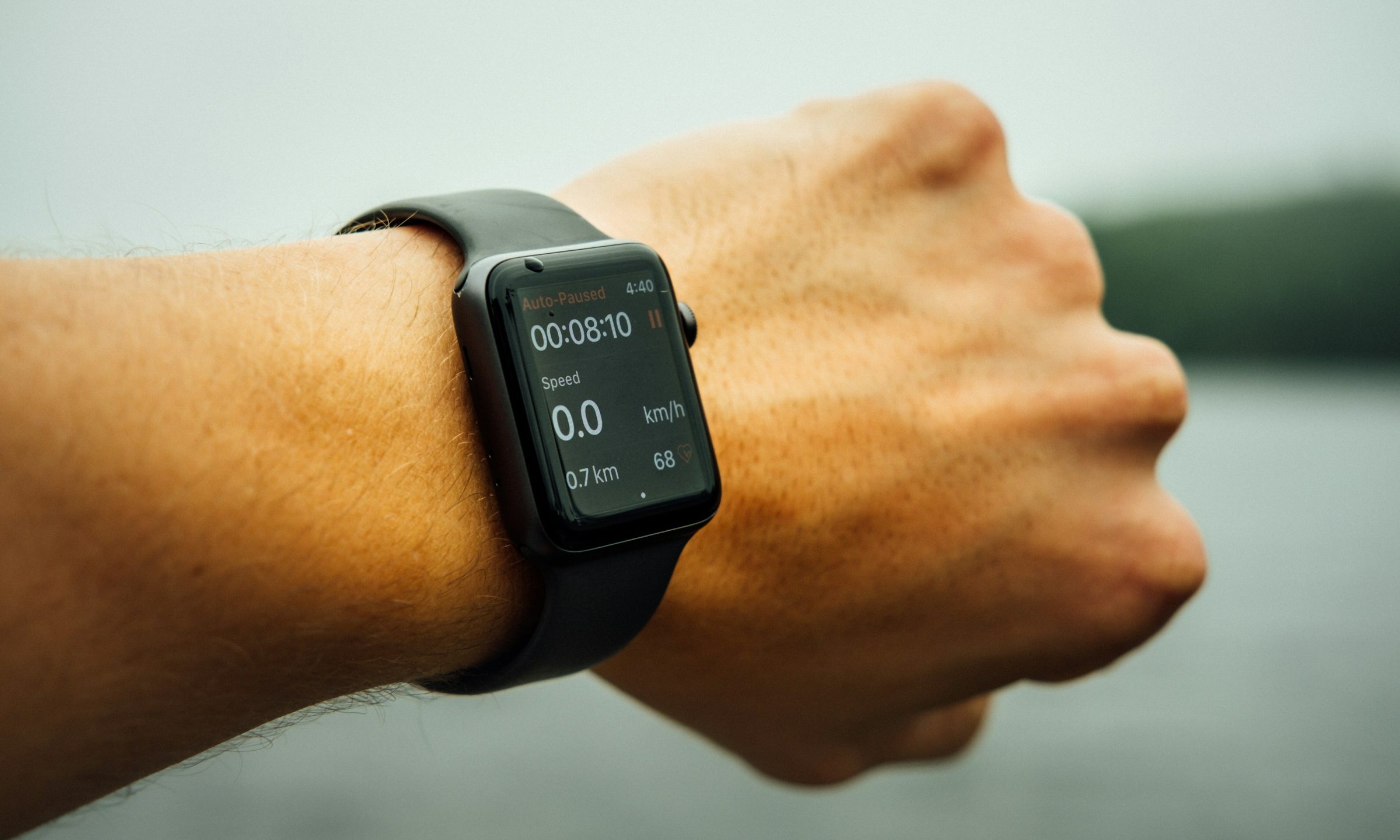Close-up of a man wearing an Apple Watch on his arm, health and fitness app