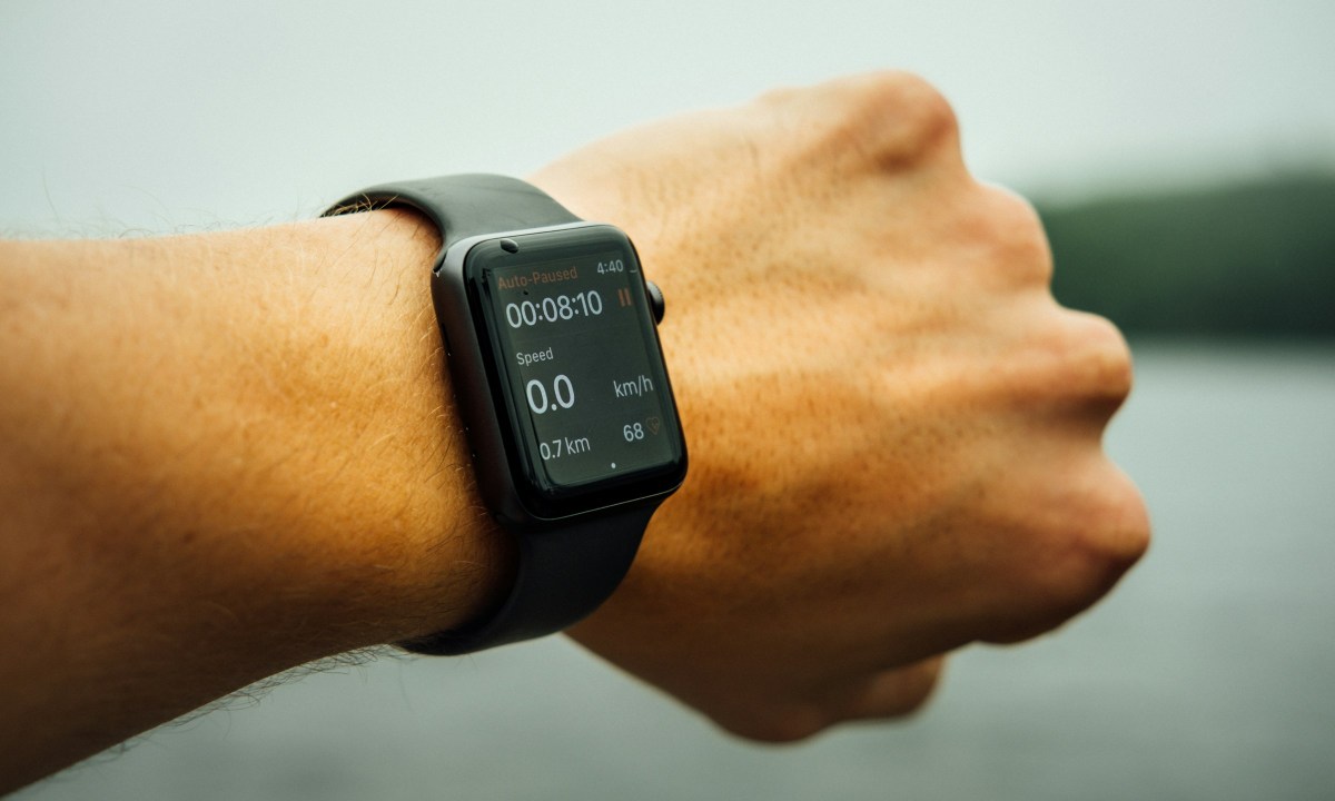 Close-up of a man wearing an Apple Watch on his arm, health and fitness app