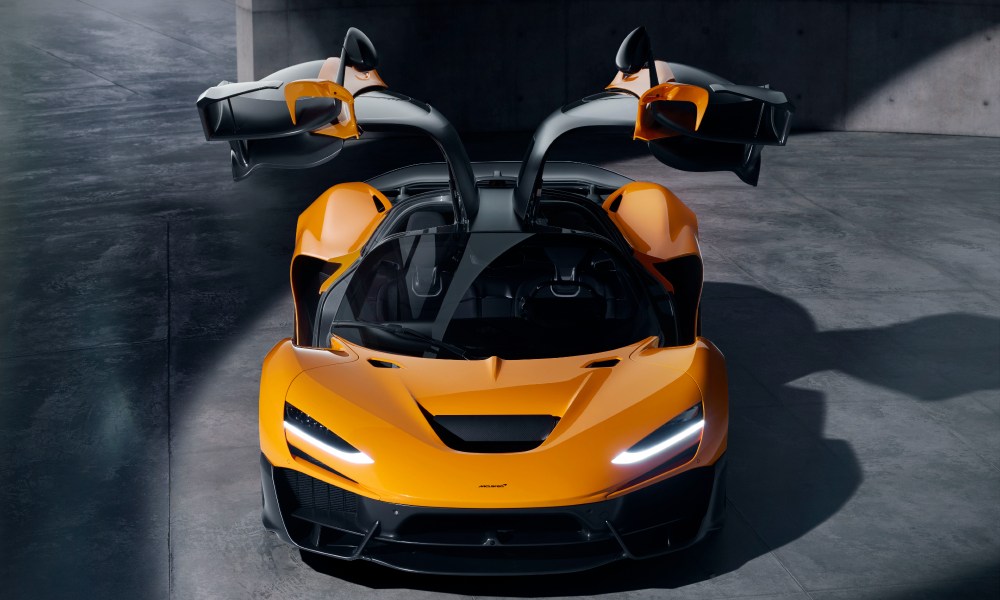 McLaren W`1 supercar high front doors open.