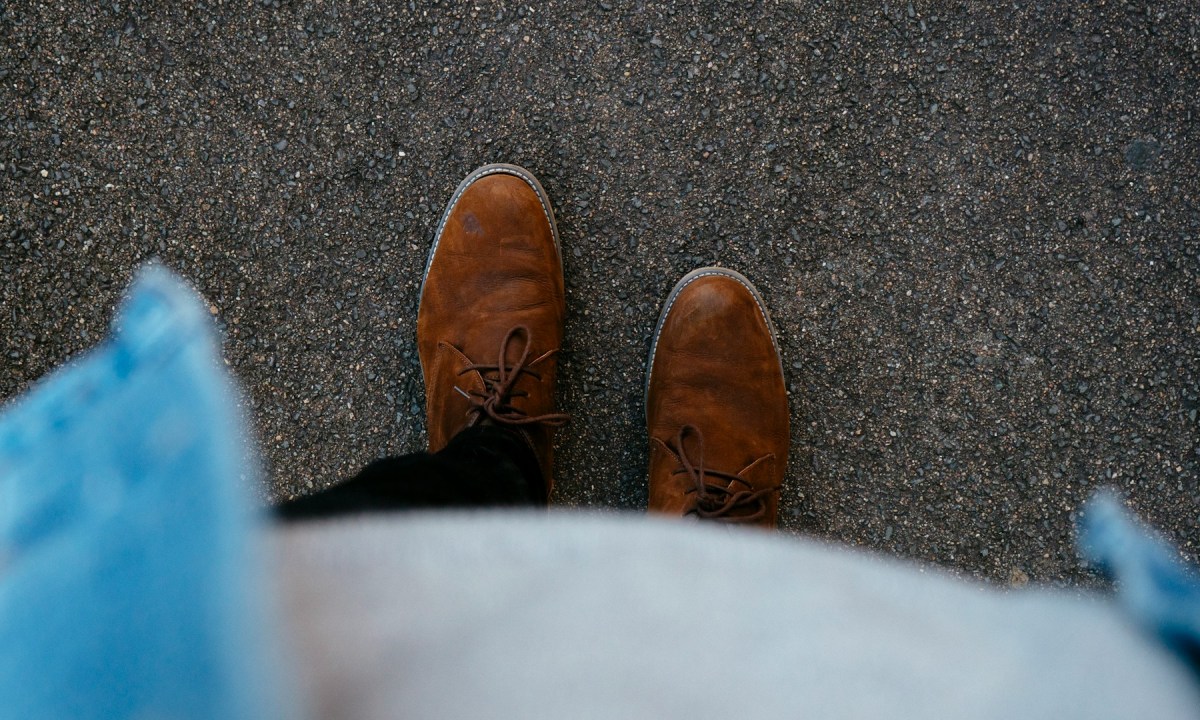 Person wearing brown suede boots