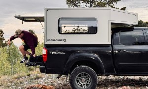 Man jumping off the back of a Moonlander X truck camper shell.