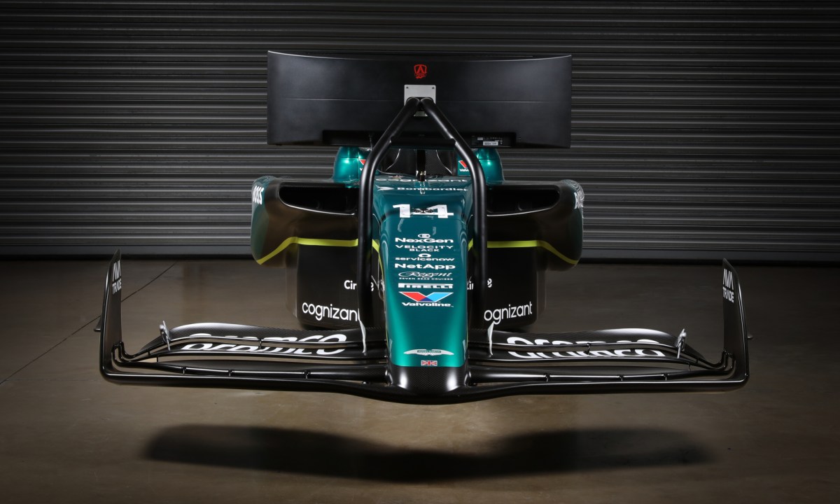 Aston Martin Aramco F1 racing simulator direct front view - it looks like it's floating.