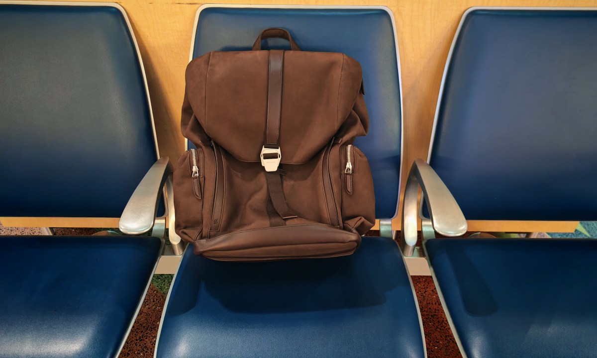 Carl Friedrik Traverse Backpack on a chair