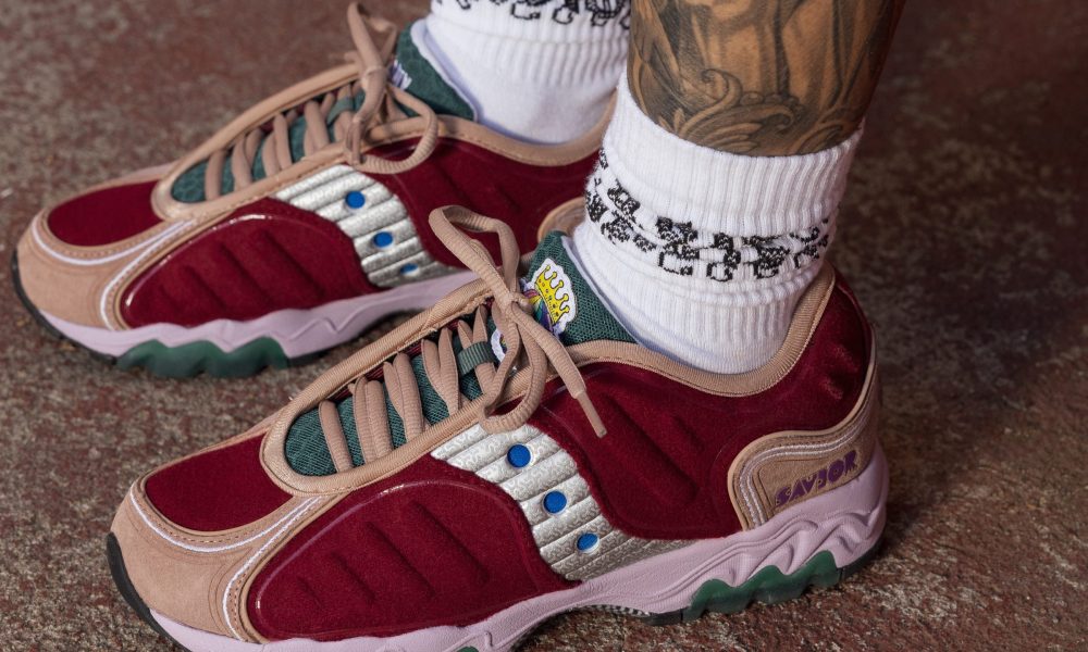 model wearing pair of saucony sneakers