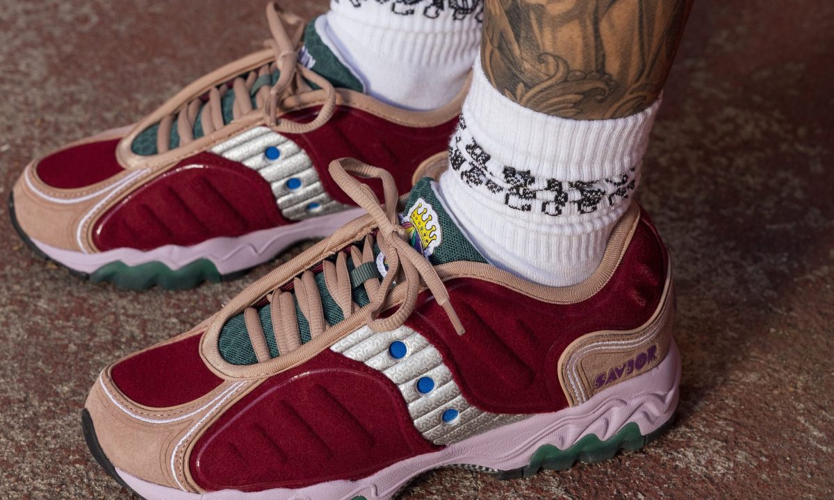 model wearing pair of saucony sneakers