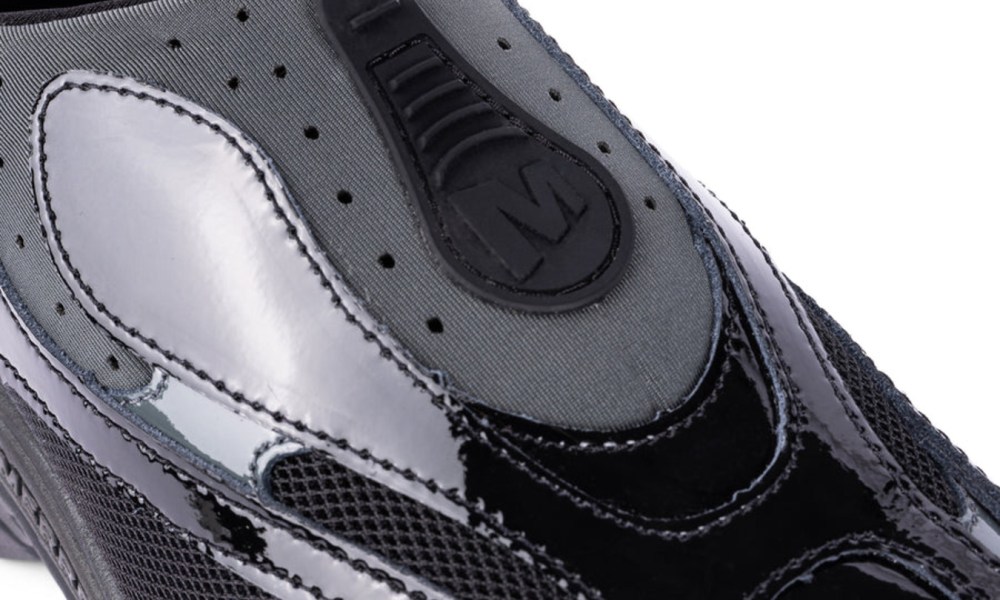 close up on black patent sneaker
