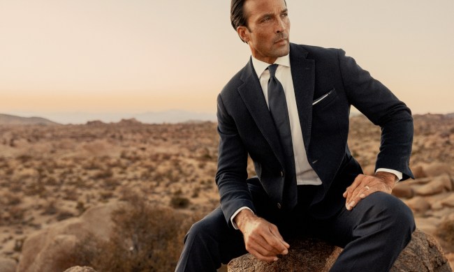 Robert Talbott bomber jacket with shirt and tie in the desert