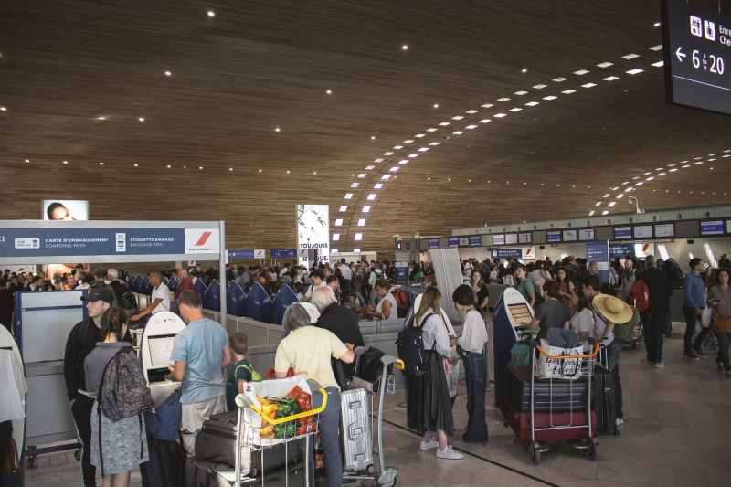 people in line in airport