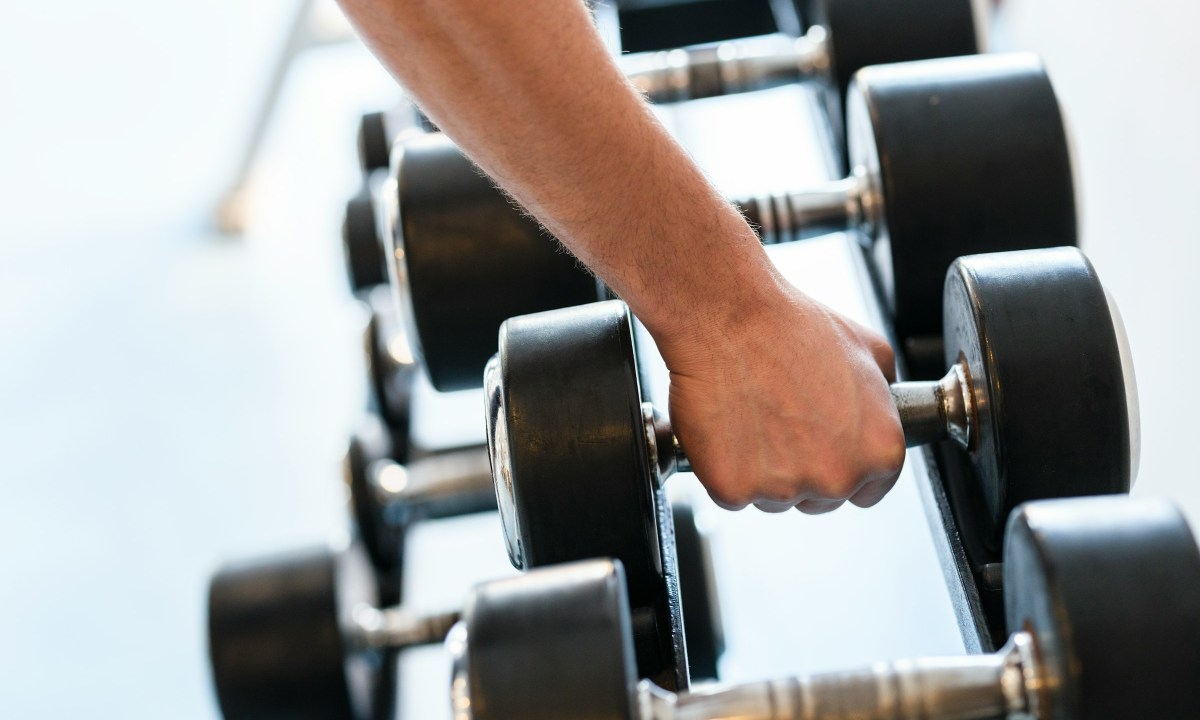 Close-up of hand holding a dumbbell