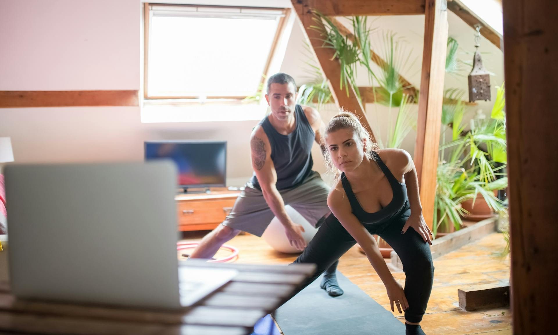 at home workout exercise man and woman class stretch yoga