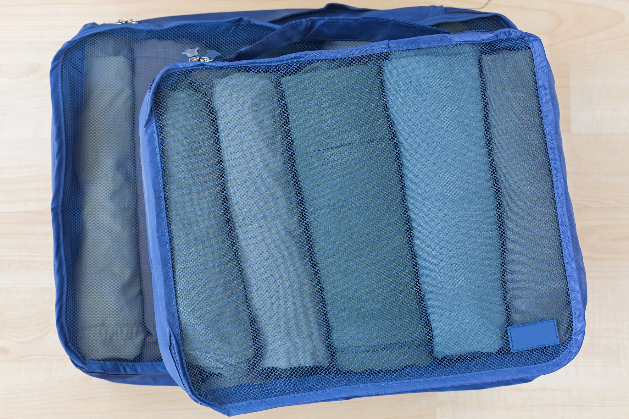 Rolling clothes for packing cubes sales