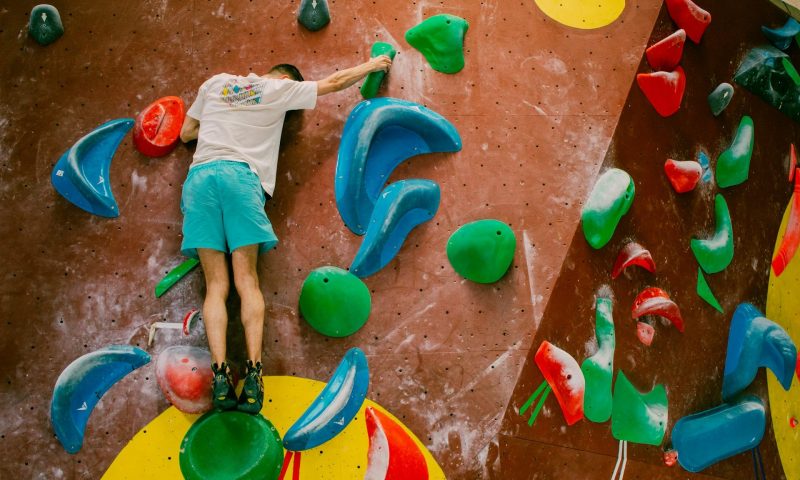 Man bouldering at a gym