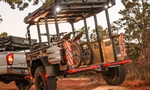 Zion Off-Road Z2 micro-camper/trailer being towed down a desert trail by a pickup truck