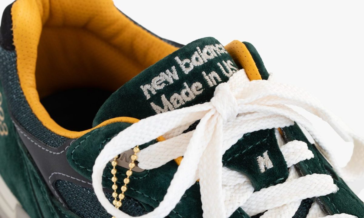 close up on green new balance sneakers