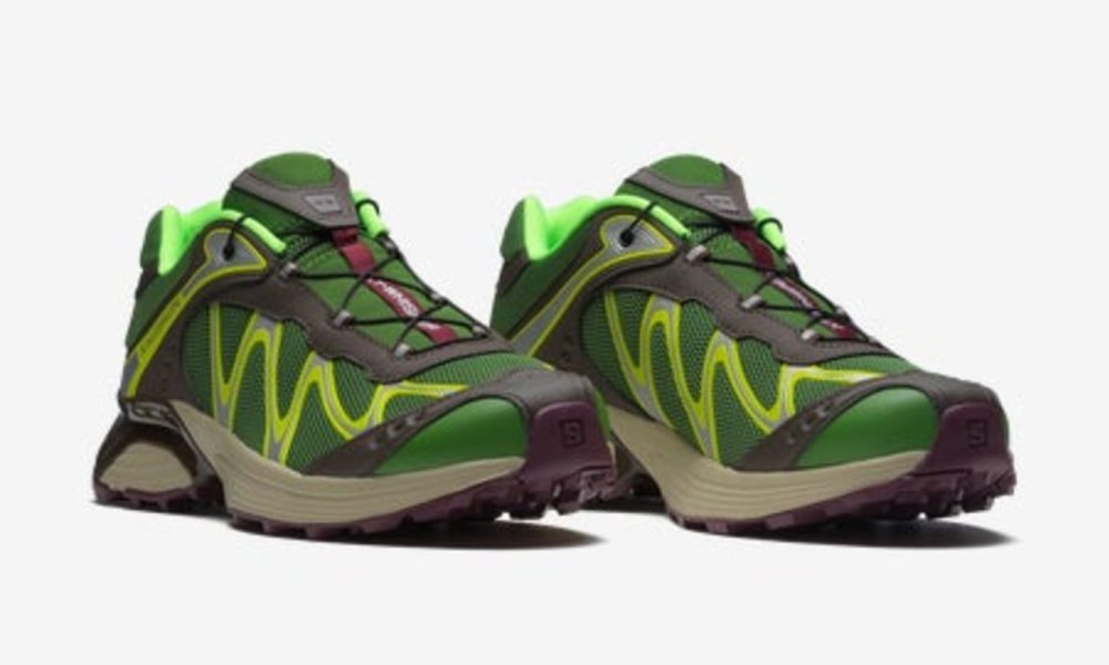two green sneakers against white background