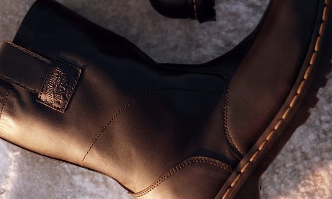 black work boot on the snow