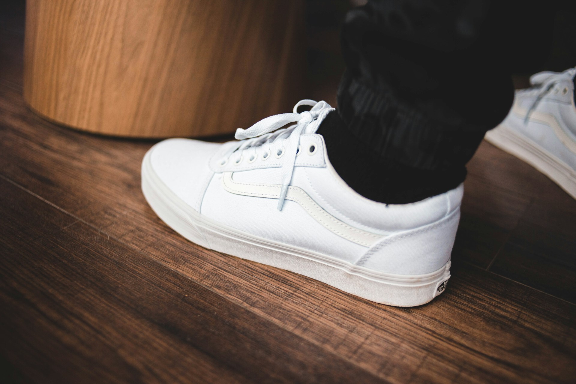 Man wearing white sneakers