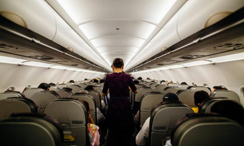 Person standing on an airplane