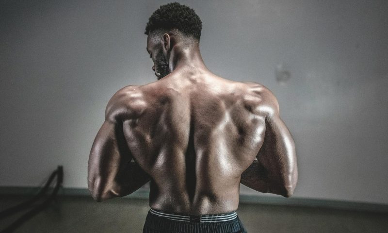 Strong man with back muscles shirtless
