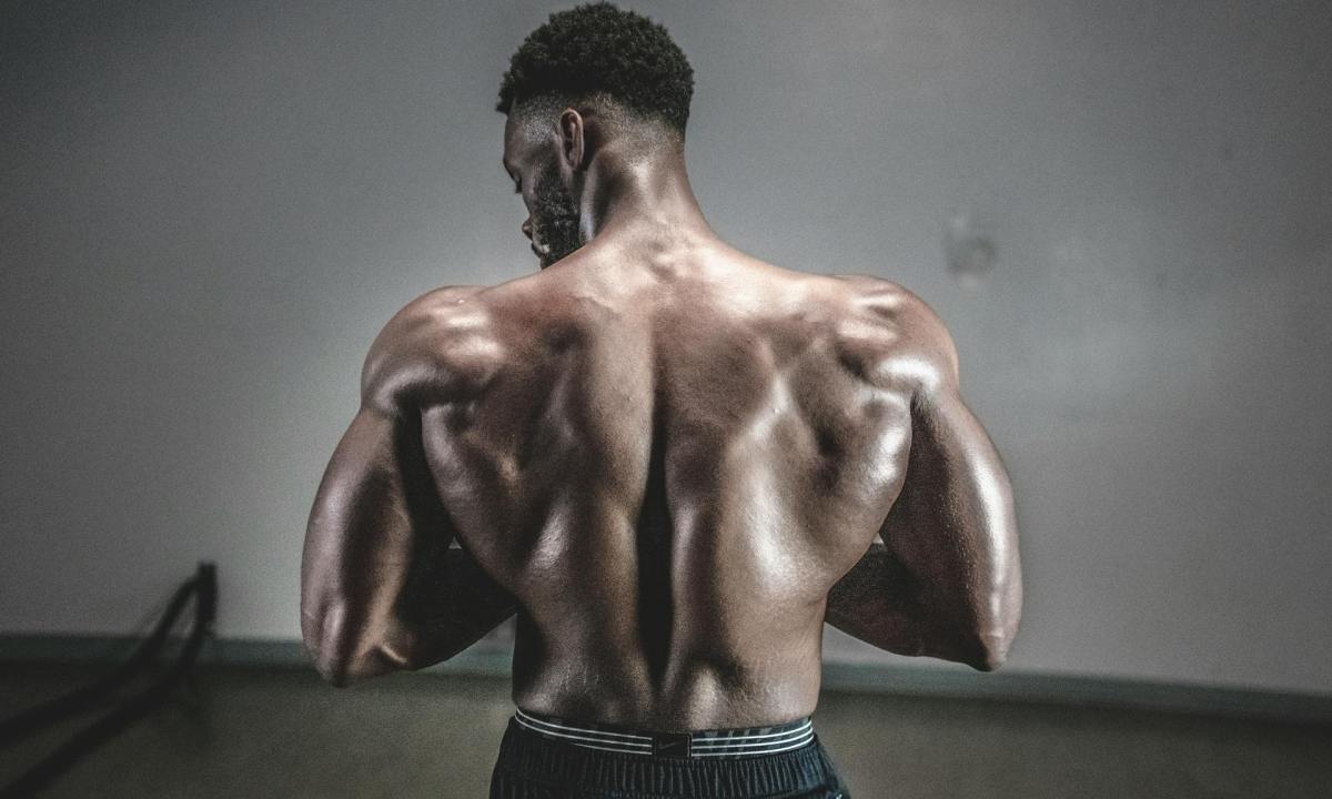Strong man with back muscles shirtless