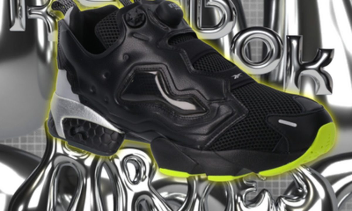 black sneaker against silver background with reebok and aries balloons around it