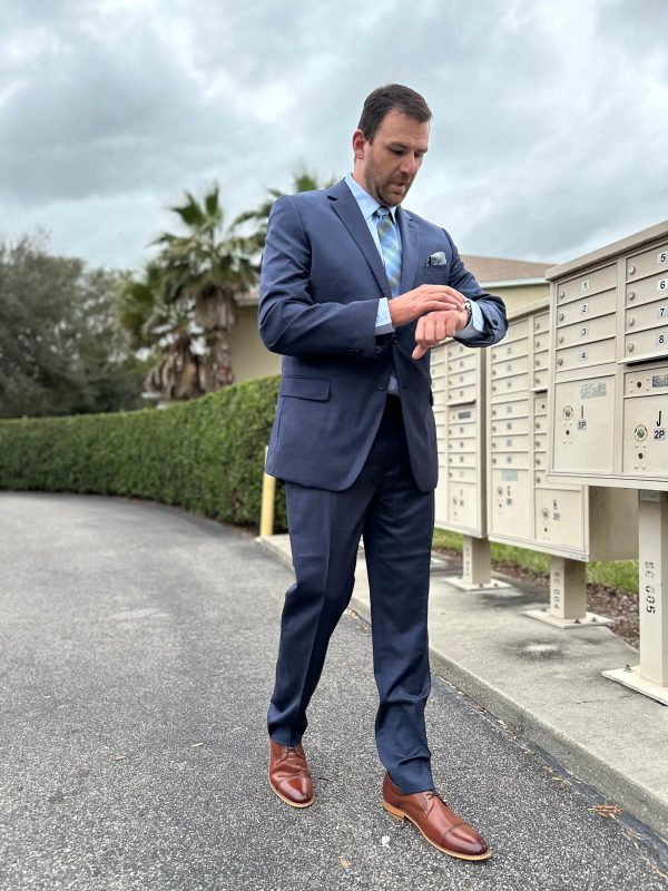 Man in Men's Wearhouse Blue Suit