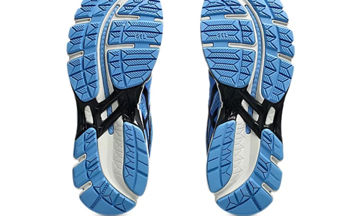 bottom sole of blue sneakers