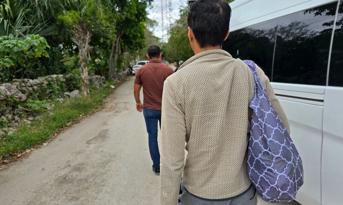 Raul Mercado following our driver Marco on our ride with Daytrip next to his white van