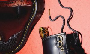 flatlay with dr martens boot