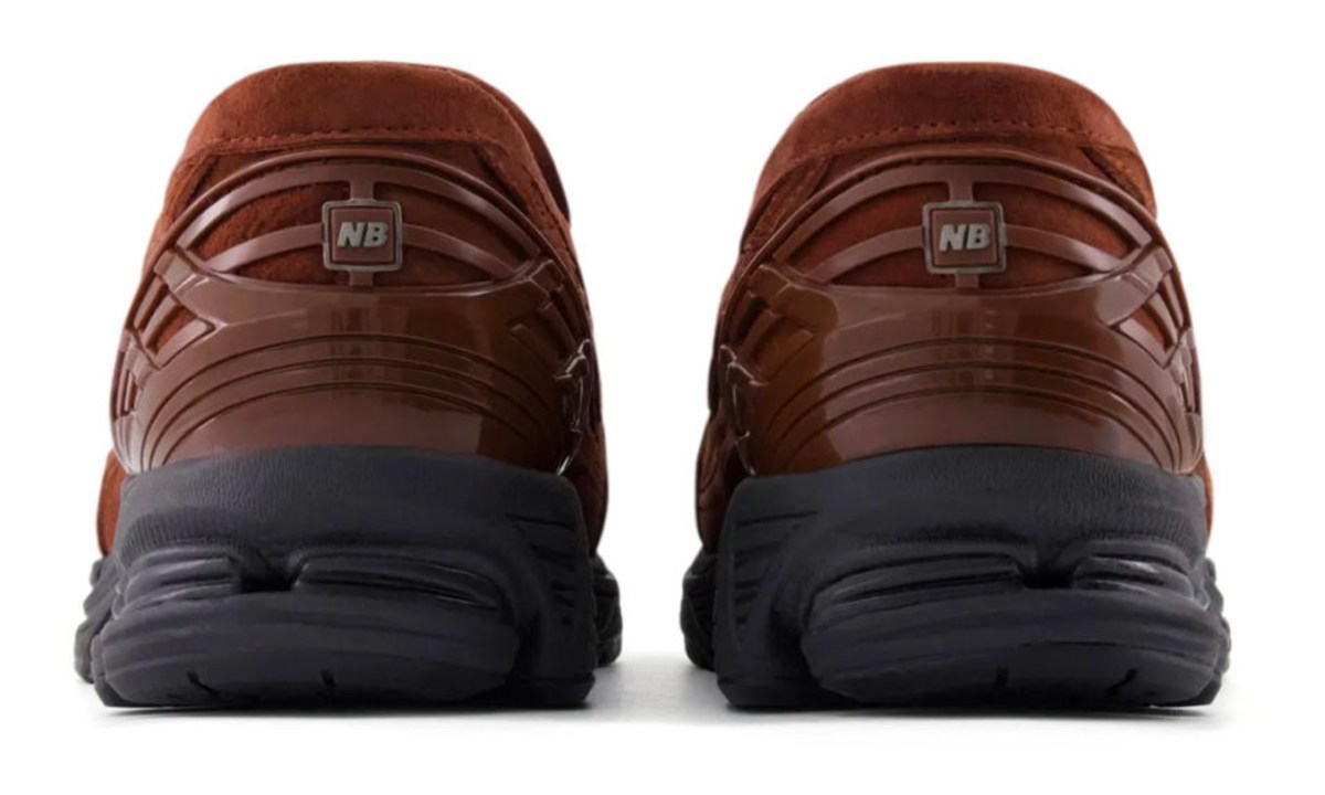 backside of brown suede new balance loafer