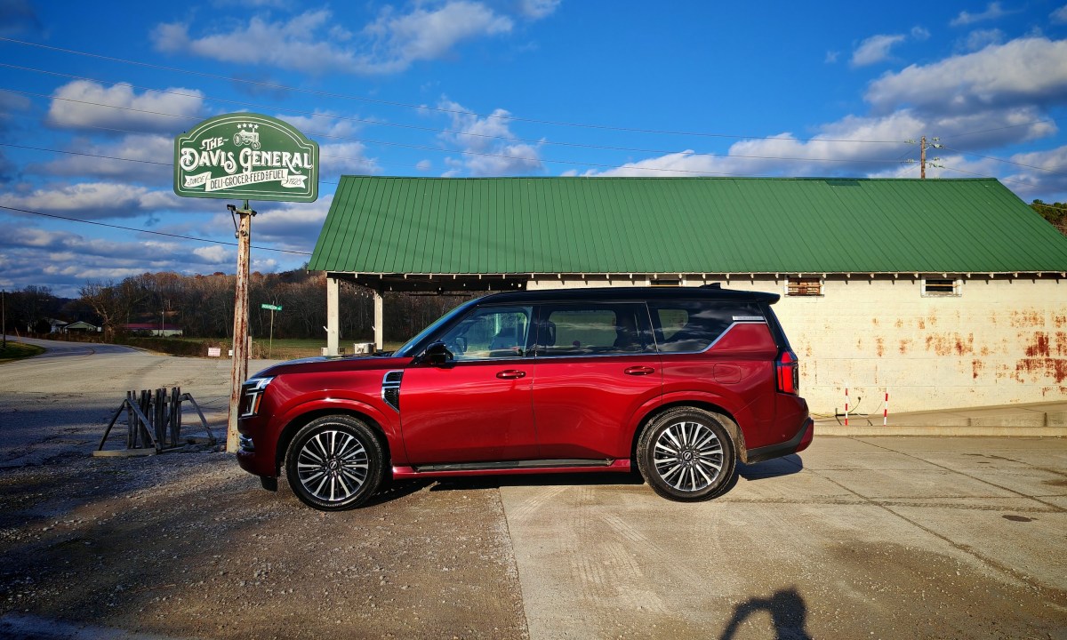 Nissan Armada parked in front of a convenience store