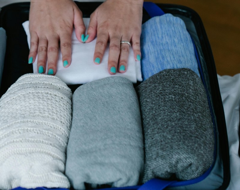 Rolled shirts in a suitcase