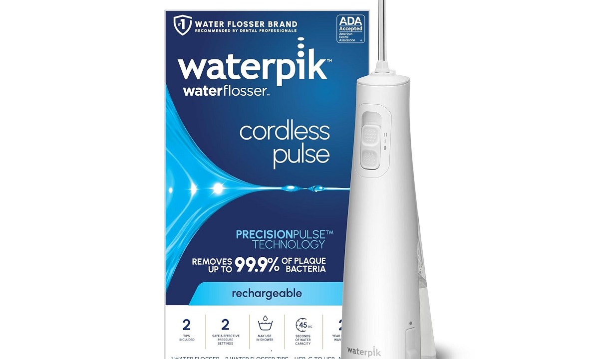 The Waterpik Cordless Pulse water flosser with its box.