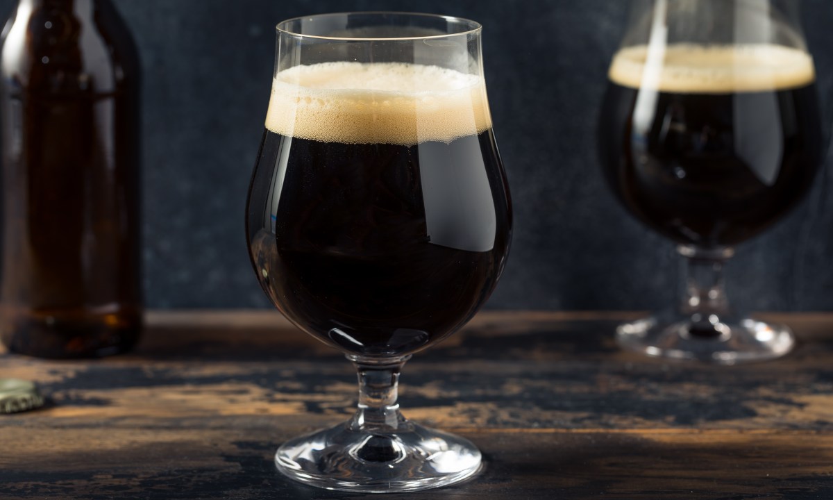 Boozy Cold Craft Porter Stout Beer in a Footed Glass